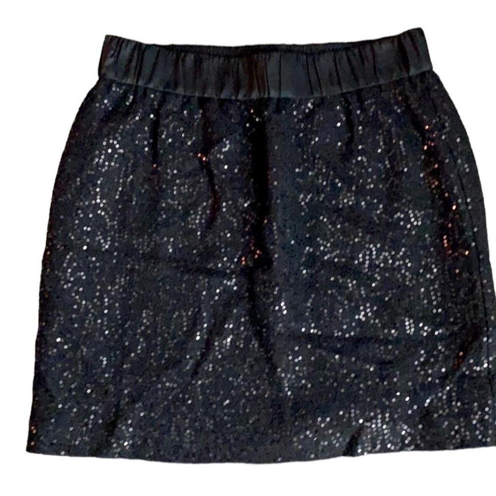 Black sequined skirt.